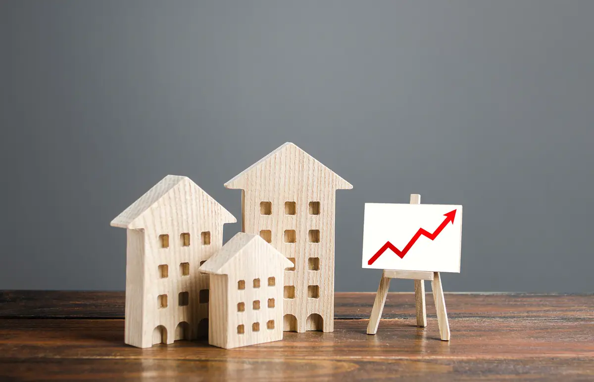 What is a property capital gain and how is it calculated?