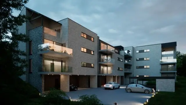 Gelijkvloers appartement met terras, kelder en parking.