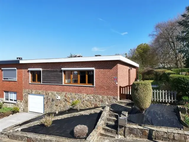 Charmante woning met veranda, tuin en garage.